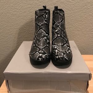 Women’s snake cleated chunky Chelsea boots